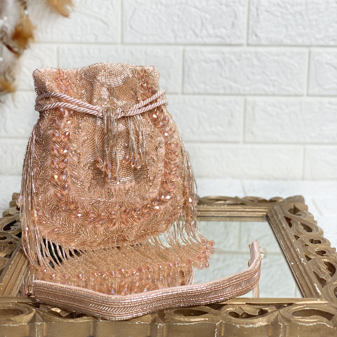 Rosegold Embellished Pearl Potli with Attached Fringes