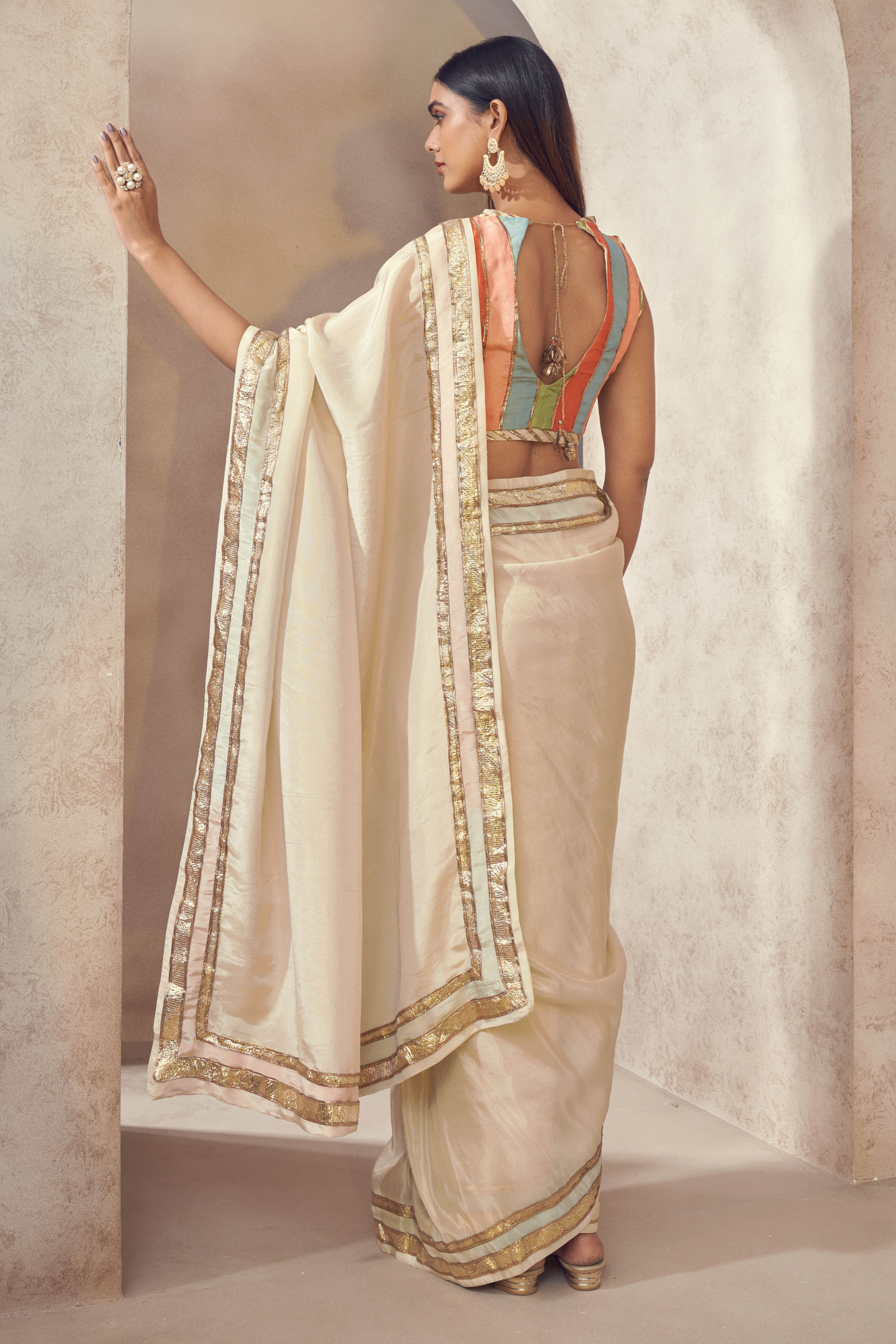 White Silk Saree with Multicoloured Blouse