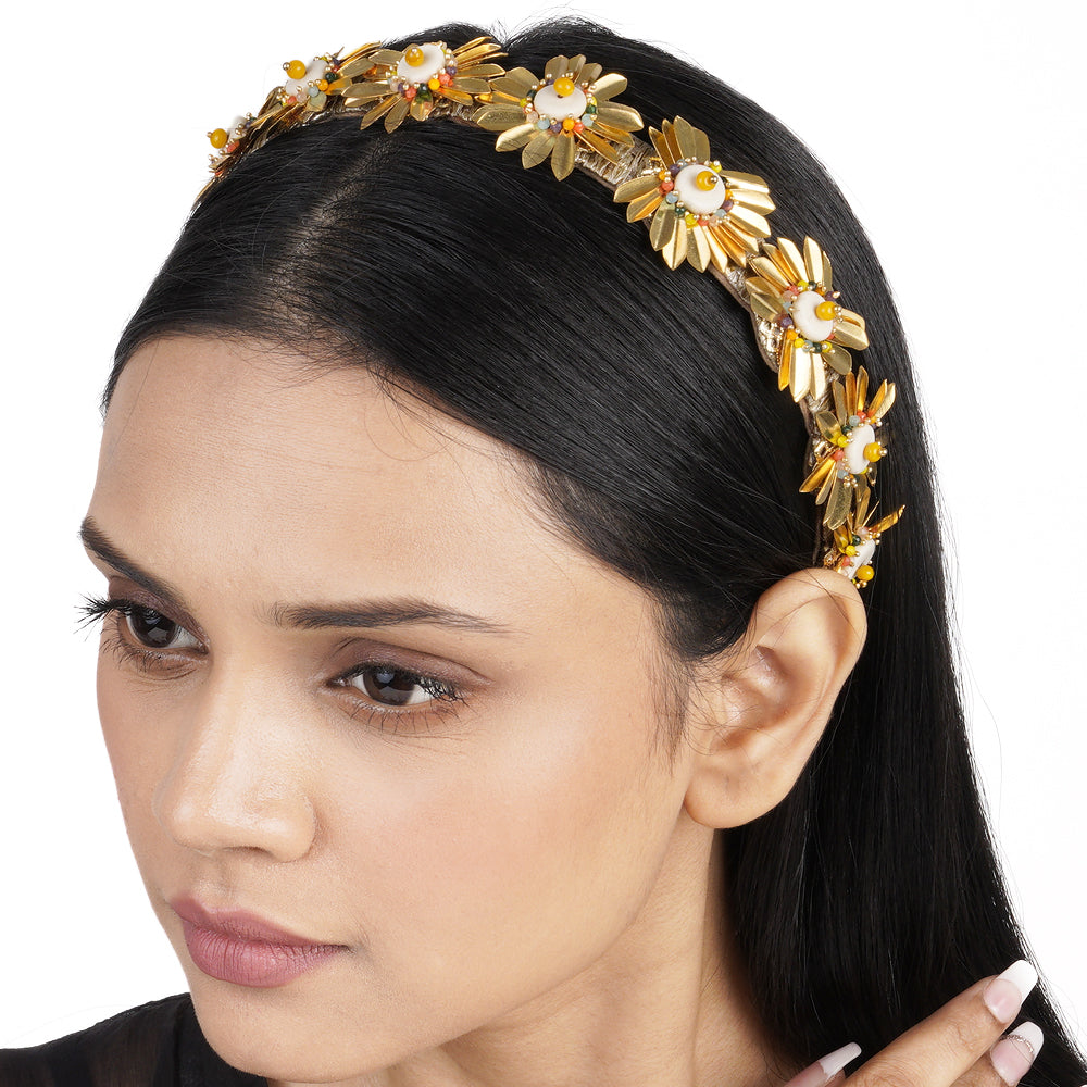 Radiant gold flower style head gear with embellished stones