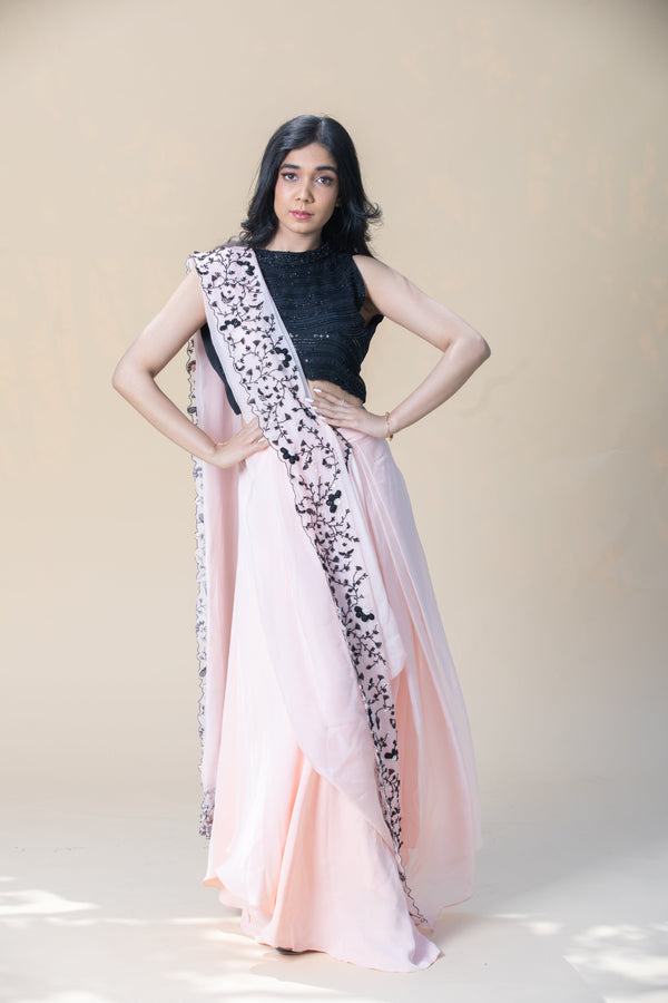 Pastel pink embroidered pre draped saree