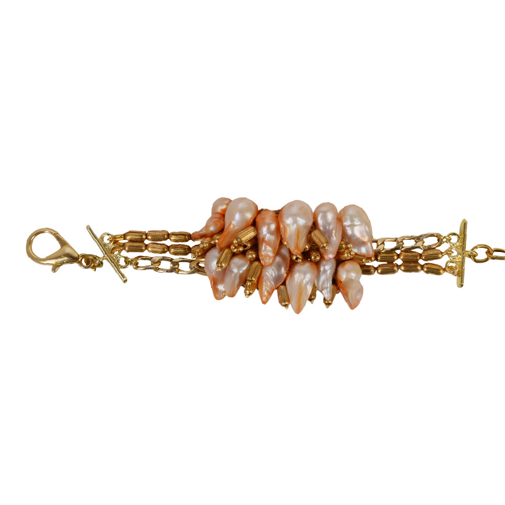 Contemporary gold and peachy vibed bracelet