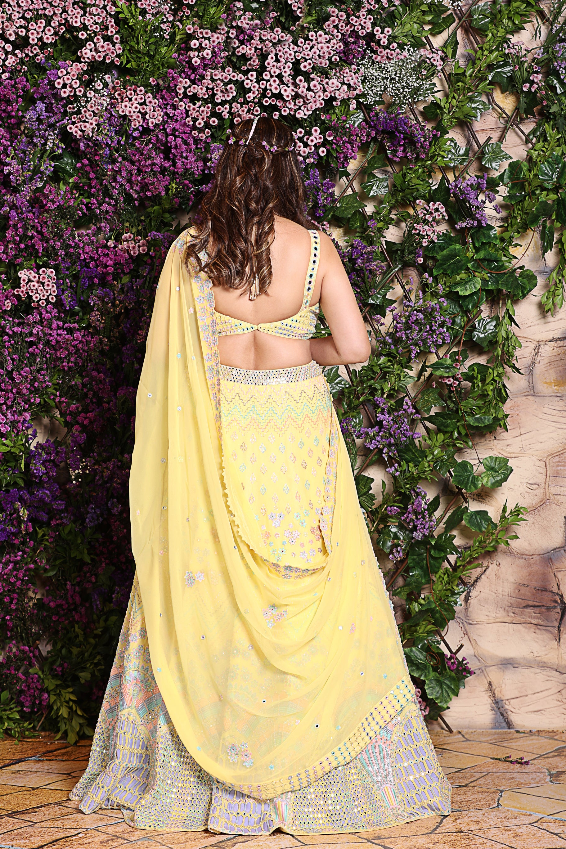 Yellow Lehenga embroidered with peacock fan motif 