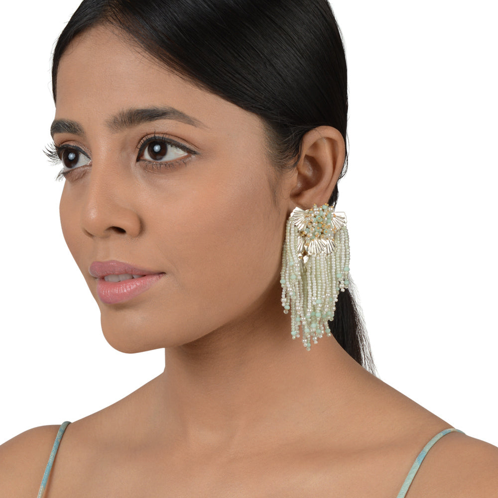 Wavy a layered turq tassel earrings