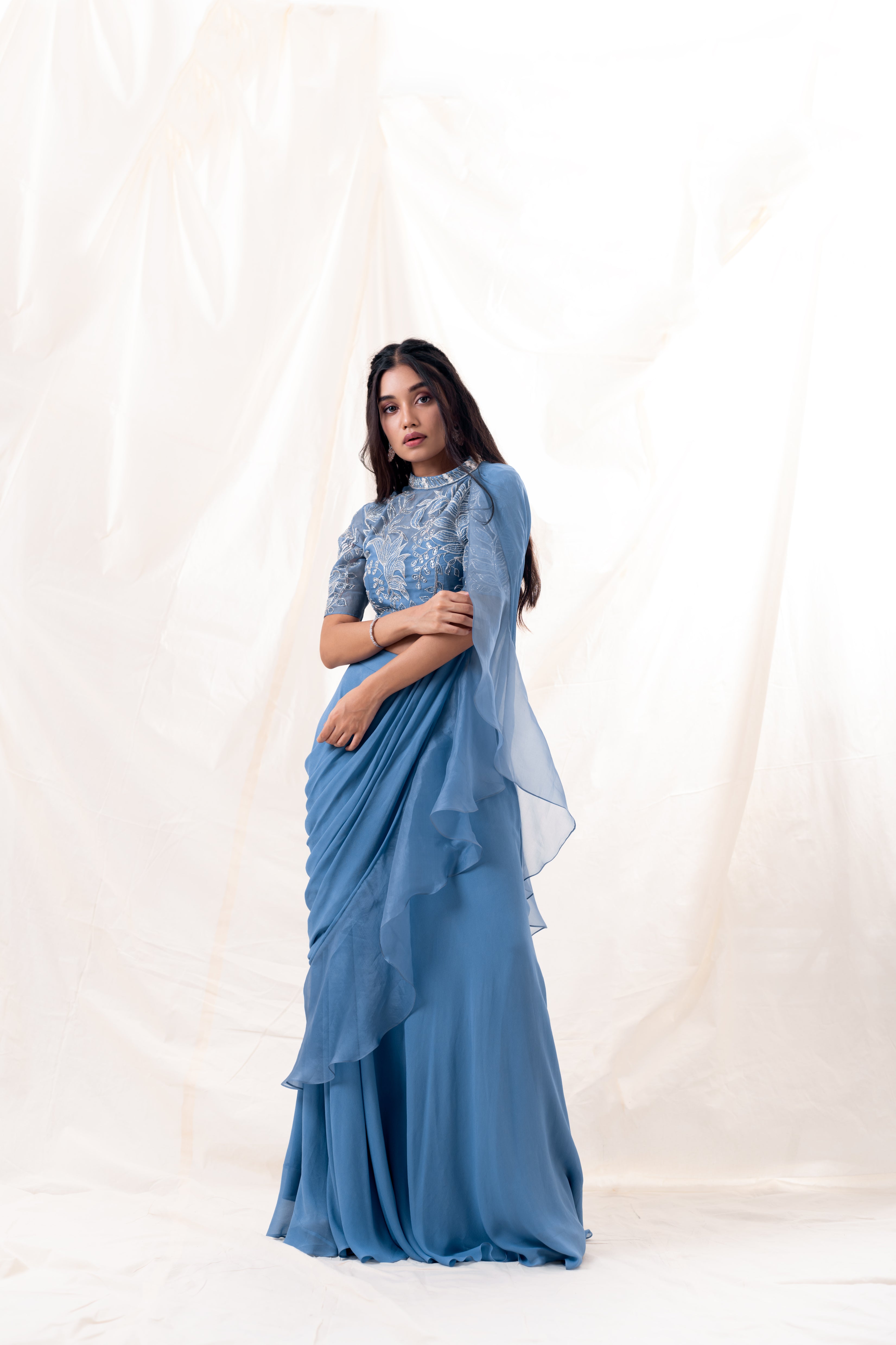 Ocean blue embroidered and draped ruffle blouse