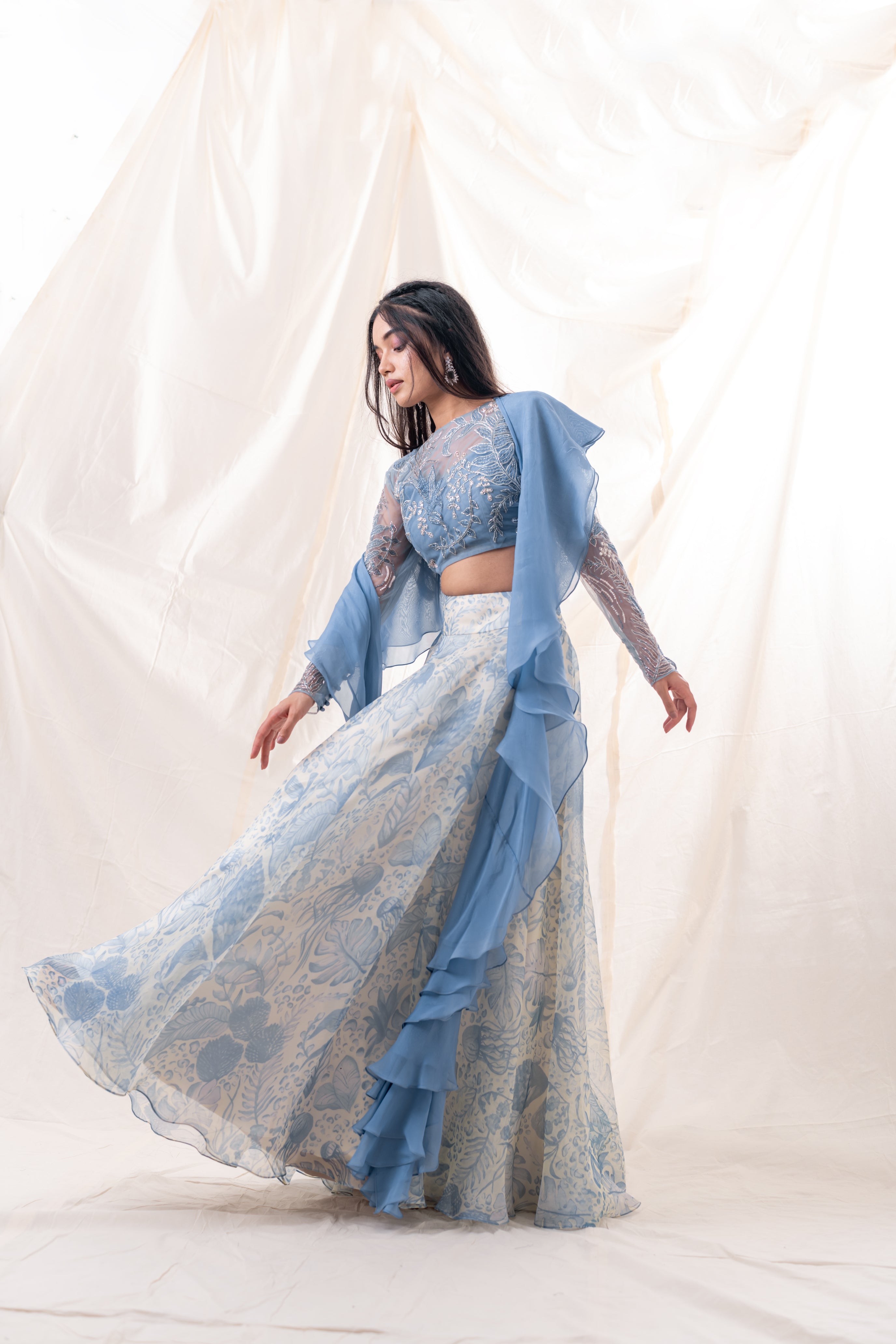 Printed organza lehenga with embroidered tulle blouse 