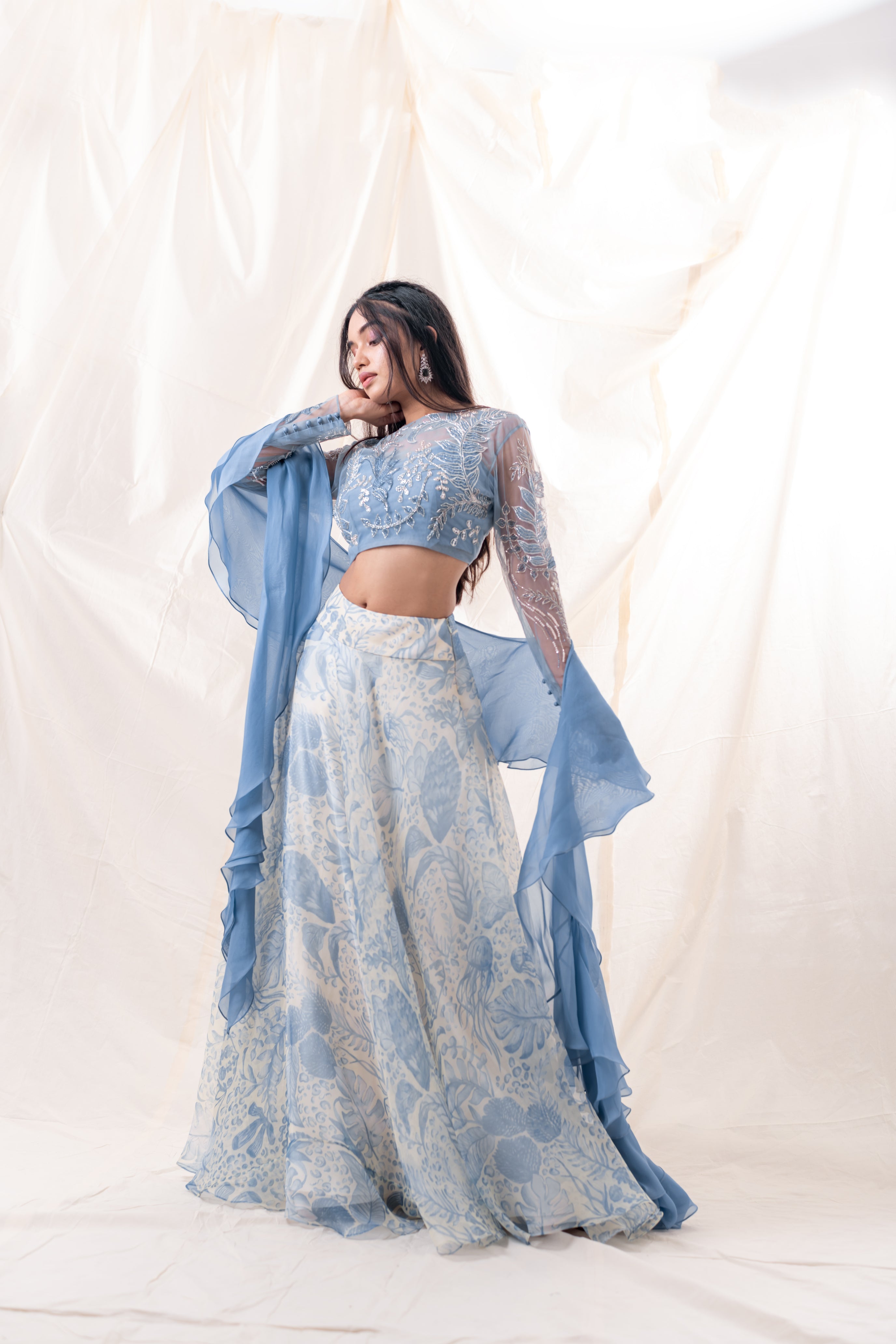 Printed organza lehenga with embroidered tulle blouse 