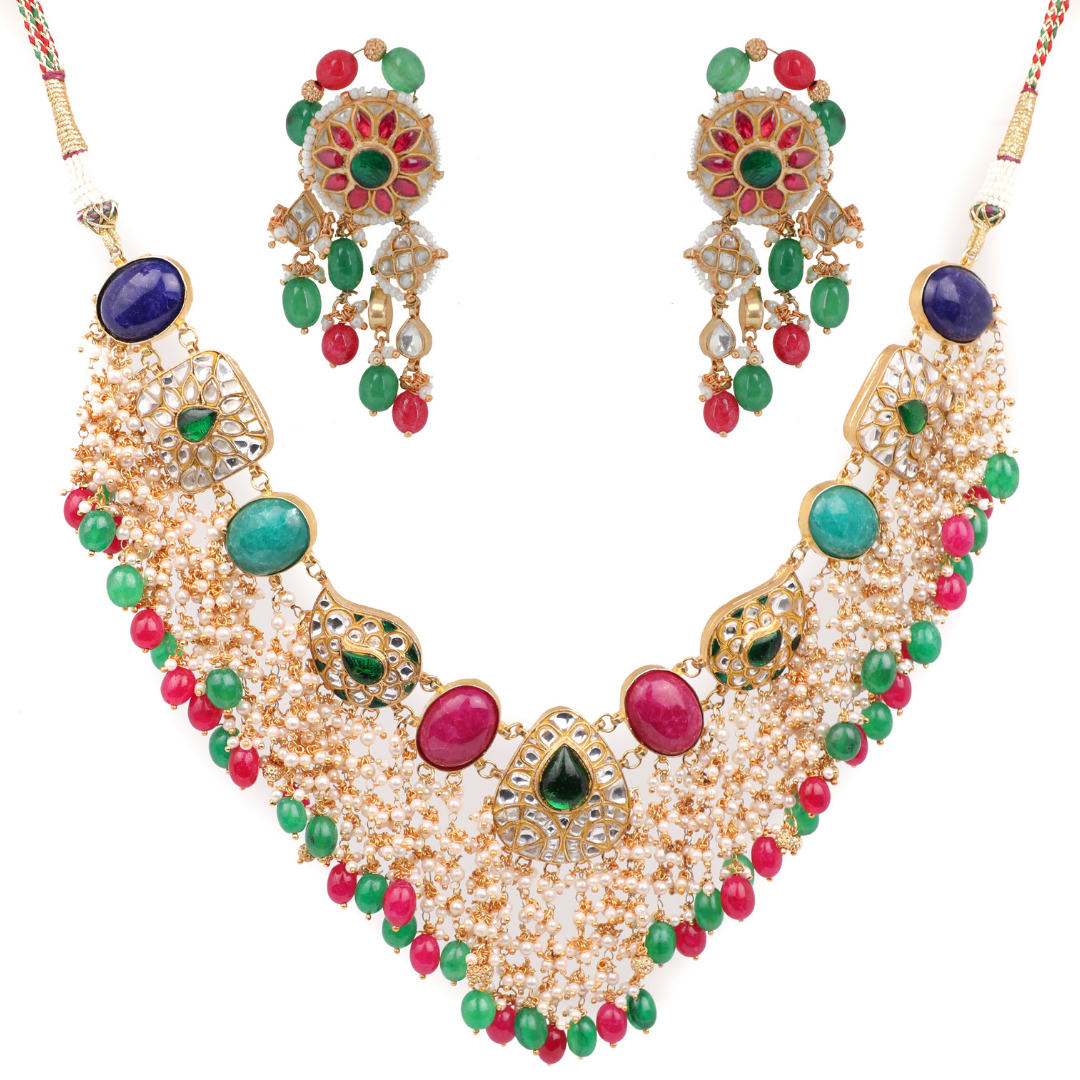 Featuring a 22 Kt gold plated pearl necklace studded with kundan polki, 