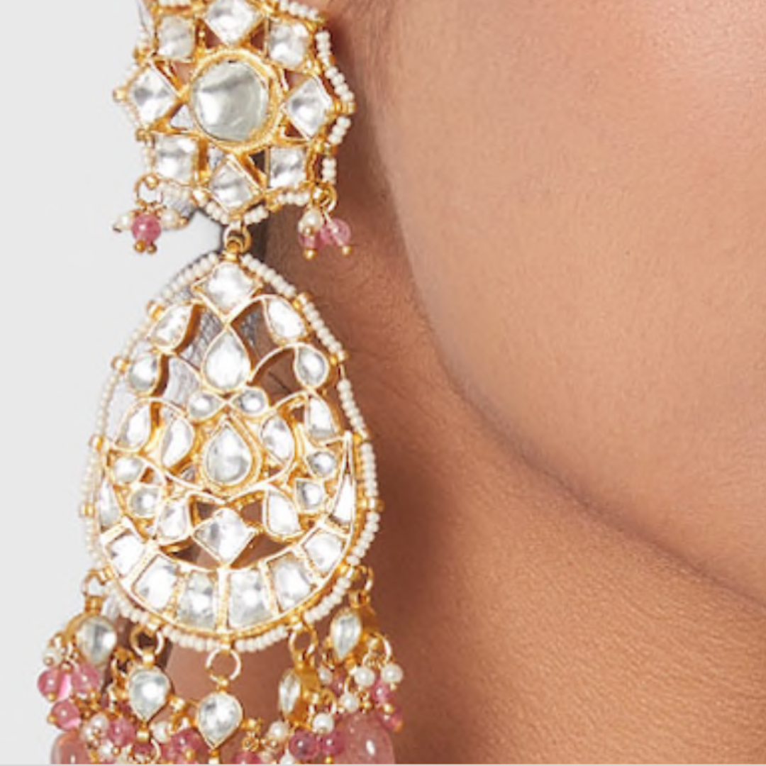 Kundan long earrings that will steal the limelight.