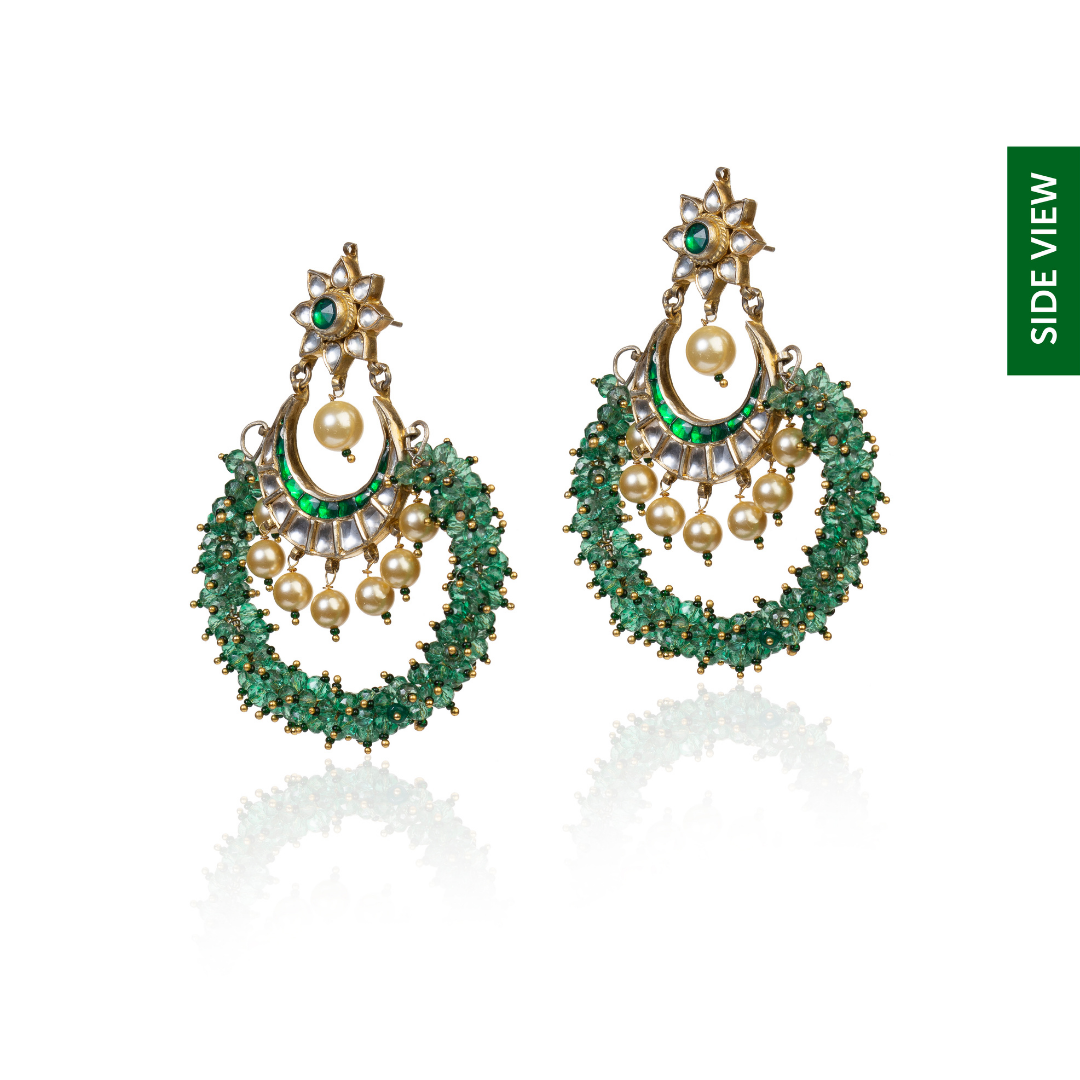 Green earrings are all set to take your look to a straight ten