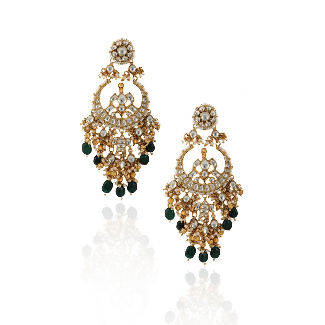 white chandbaali earrings with golden balls and green beads,