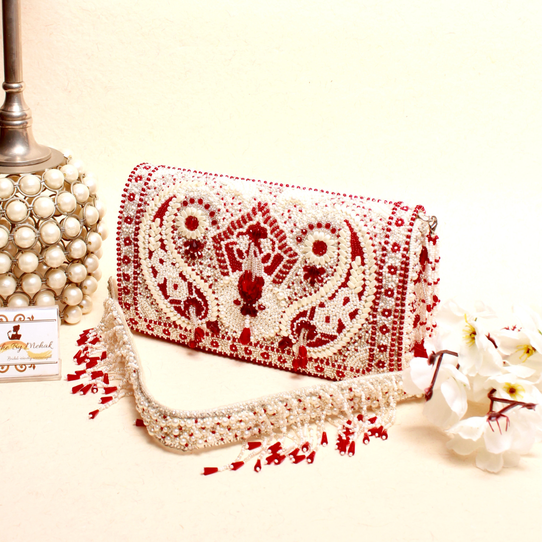 Kainiche By Mehak  red clutch