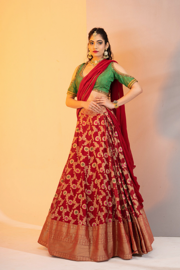Red brocade skirt with green silk blouse