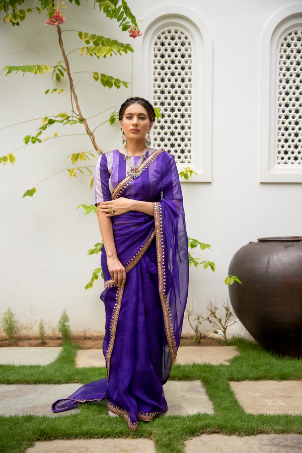purple saree in silk organza base with hand folded gota Patti Border