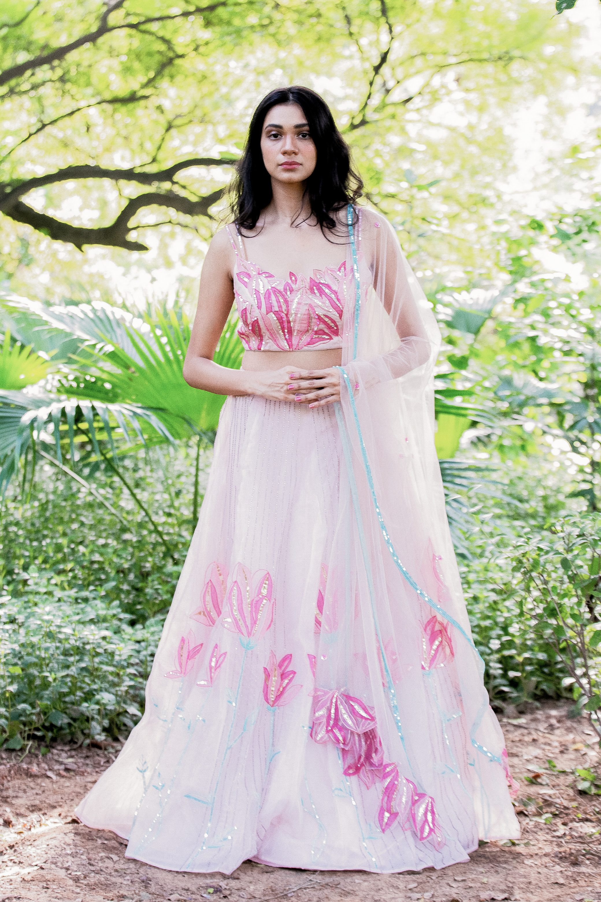 This set features a rose water pink  hand embroidered organza skirt set