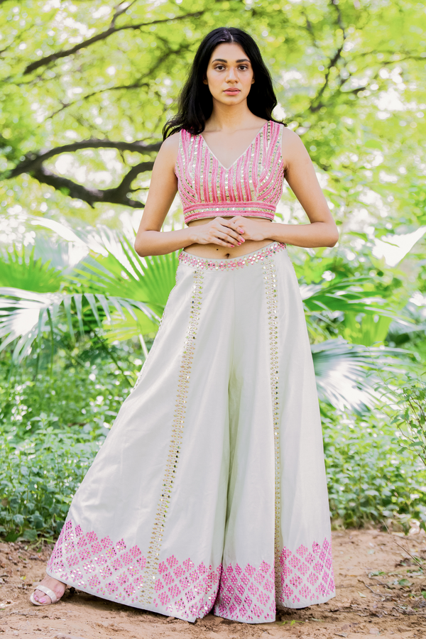 This ivory sharara set features mirror embroidery pants,